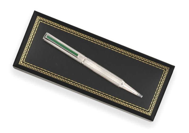 A Dunhill Ballpoint Pen, Numbered 56283, reeded, the clip and top each with green enamel, with black