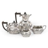 A Four-Piece Edward VII Silver Tea-Service, Probably by W. G. Keight and Co., Birmingham, 1904, each