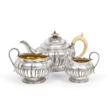 A Three-Piece George III and George IV Silver Tea-Service, by Joseph Angell, London, 1819 and