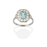 An Art Deco Style Aquamarine and Diamond Cluster Ring, the emerald-cut aquamarine within a border of