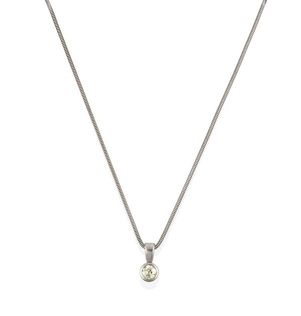 A Diamond Solitaire Pendant on Chain, the round brilliant cut diamond in a white rubbed over