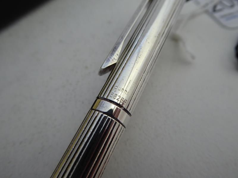 A Dunhill Ballpoint Pen, Numbered 56283, reeded, the clip and top each with green enamel, with black - Image 5 of 8
