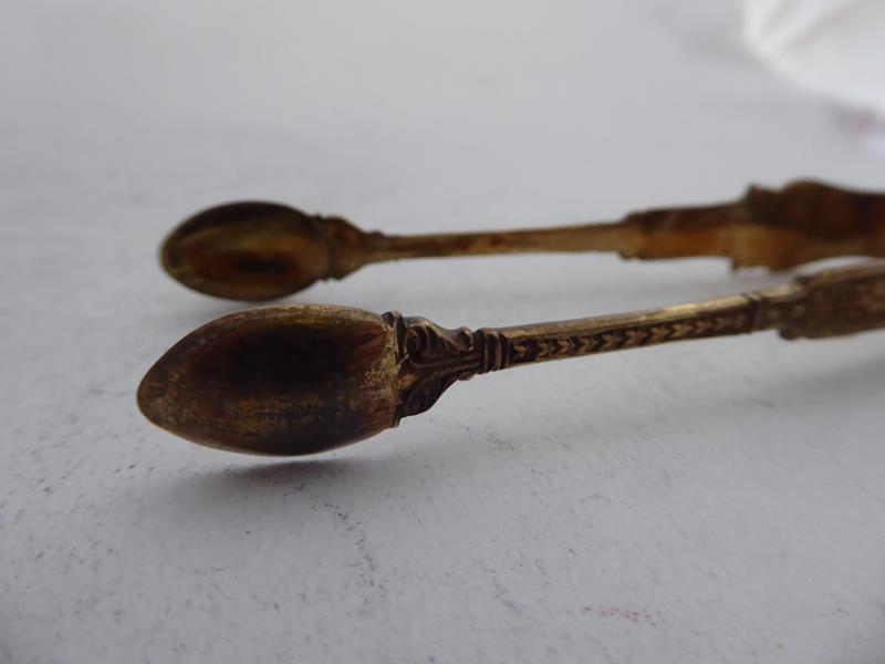 A Set of Twelve George V Silver-Gilt Teaspoons and a Pair of Sugar-Tongs, by Manoah Rhodes and - Image 35 of 37