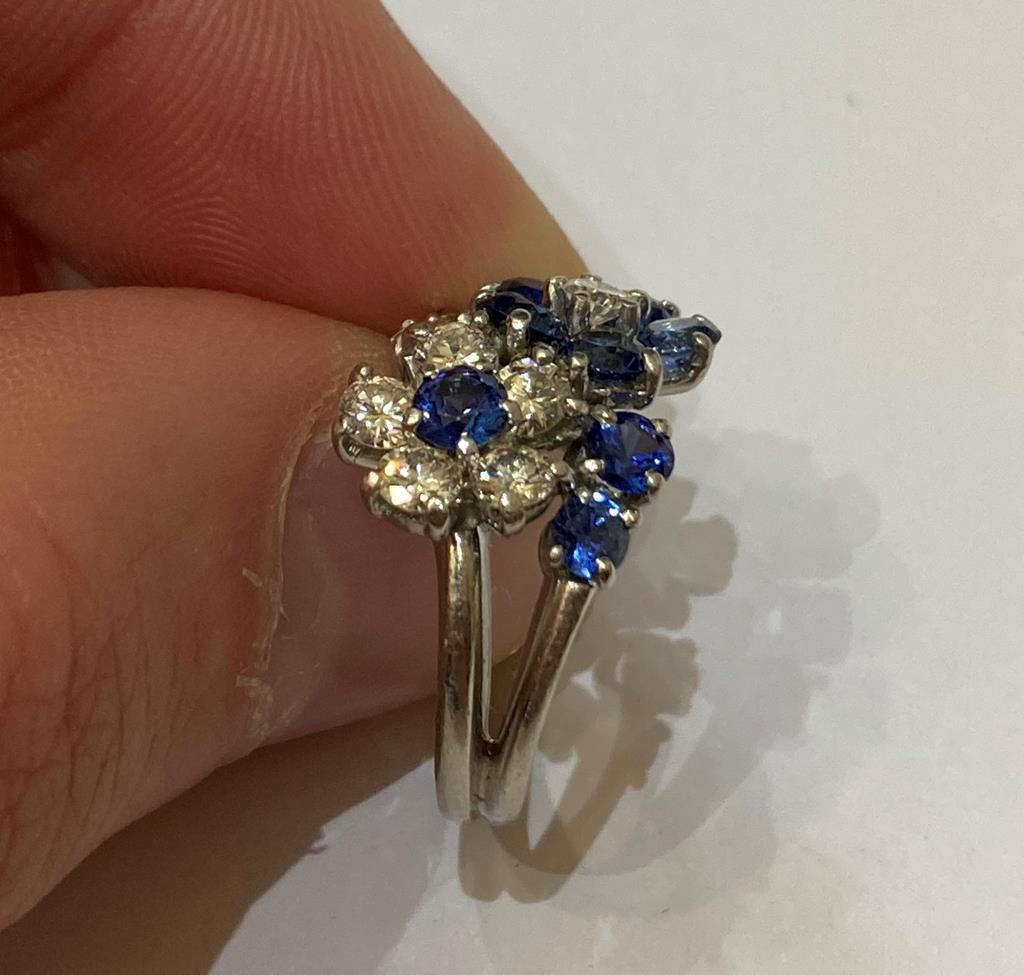 A Sapphire and Diamond Cluster Ring, realistically modelled as two floral motifs, one cluster formed - Image 3 of 6