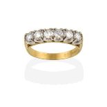 An 18 Carat Gold Diamond Six Stone Ring, the round brilliant cut diamonds in white claw settings, to