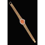 A Lady's 9 Carat Gold Diamond Set Wristwatch, signed Girod Bueche, circa 1980, lever movement, coral