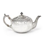 An Edward VII Silver Teapot, James Dixon and Sons Ltd., Sheffield, 1903, compressed globular, with
