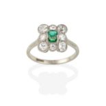 An Emerald and Diamond Cluster Ring, two emerald-cut emeralds within a border of old cut diamonds,