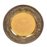 A George V Silver-Gilt Dish, by The Goldsmiths and Silversmiths Co. Ltd., London, 1928, circular