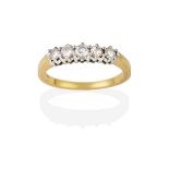 An 18 Carat Gold Diamond Five Stone Ring, the round brilliant cut diamonds in white claw settings,