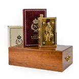 Camus Napoleon Cognac, presented in a gilt porcelain book form decanter for the bicentenary of the