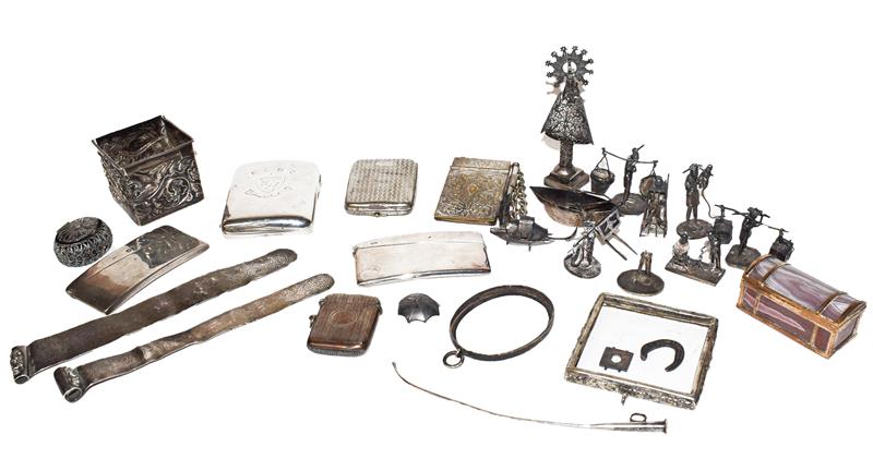 A collection of items, comprising: a silver card-case, a silver vesta-case, a silver cigarette-box