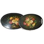 A graduated set of two Victorian painted papier mache trays
