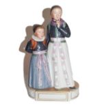 Royal Copenhagen Amager Boy and Girl, model 12105, 22cm highGood condition throughout.