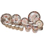 A quantity of Royal Crown Derby Old Imari pattern, plates, cups and saucers, (qty)
