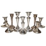 A collection of assorted silver candlesticks, a/f, filled (one tray)