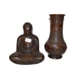 A Chinese bronze statue of a seated Buddha, together with a Japanese bronze vase after a Chinese