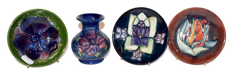 Two Moorcroft pin dishes, a small dish and a squat vase (4)