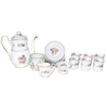 A Shelly Crochet pattern coffee set comprising six coffee cans and saucers, cream, sugar and