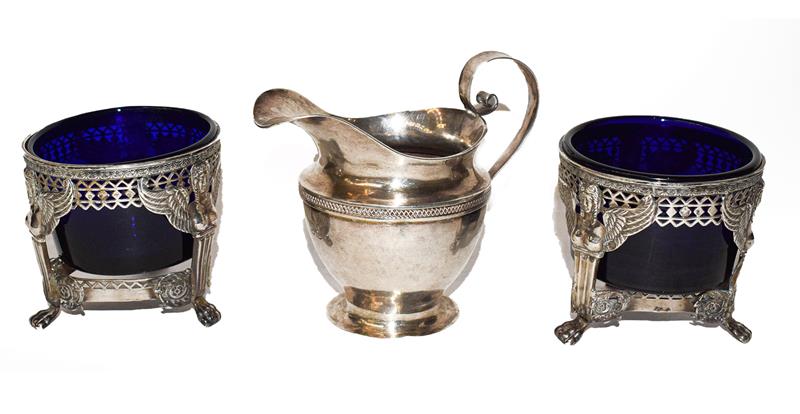 A Pair of Empire Style Salt-Cellars, Possibly French, each with openwork side and winged figure-