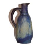 A Daum Nancy glass jug, mottled purple and yellow signed DAUM NANCY, 25cm high