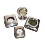 Three various silver watch cases and a silver cased time-piece (4)