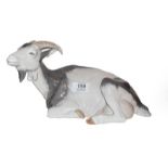 Royal Copenhagen Recumbent Goat, model 466, Chr Thomsen, 15cm by 27cmGood condition throughout.