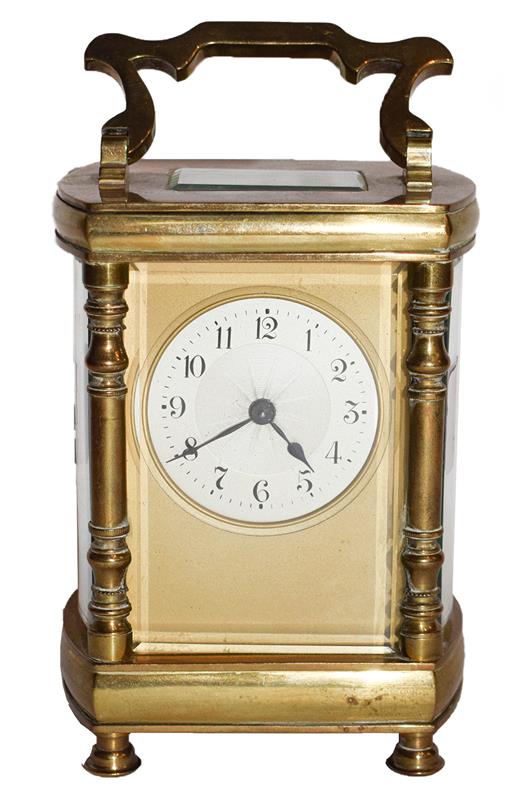 Brass cased bow sided carriage timepiece, circa 1900, movement stamped R & Co.