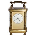Brass cased bow sided carriage timepiece, circa 1900, movement stamped R & Co.
