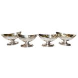 A Set of Four George III Silver Salt-Cellars, London, 1788, each oval and on spreading foot, later