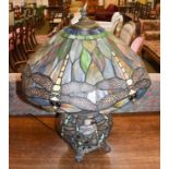 A Tiffany style table lamp, decorated with dragon flies to the shade and body, 53cm . (in good