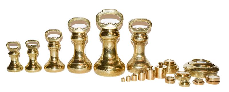 A quantity of assorted brass weights including bell formed examples by T M Smirk, Newcastle and