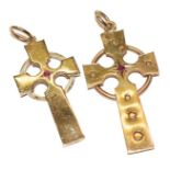 Two 9 carat gold cross pendants, length 6.1cm by 5.5cm . Gross weight 21.9 grams.