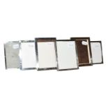 A collection of Six Various Silver-Mounted Photograph-Frames, each oblong, four plain and two with