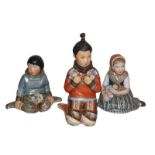 Three Royal Copenhagen figures, Greenland Girl, Greenland Boy and Slesvig Girl, Carl Martin