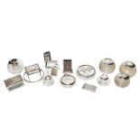 A collection of assorted silver smoking accessories, including: silver-mounted glass match