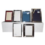 A collection of Six Various Silver-Mounted Photograph-Frames, each oblong, one with engine-turned