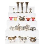 A collection of assorted silver, including: a pair of sauceboats; four various five-bar
