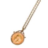 A half sovereign dated 1914 mounted as a pendant on a 9 carat gold chain, chain length 61cm .