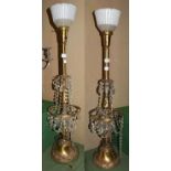 A pair of gilt metal lustre drop table lamps with up lighter shades, 95cm overall