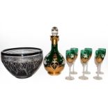 A Murano emerald glass liqueur set with gilt and enamel embellishments; together with a black