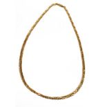 A fancy link necklace, stamped '14K', length 45.5cm . Gross weight 27.8 grams.