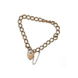 A 9 carat gold curb link bracelet with a heart shaped padlock clasp, length 19.5cm . Gross weight