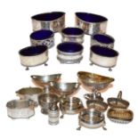 A collection of assorted silver salt-cellars, including: a pair of George III cauldron shaped