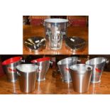 A pair of Bollinger Champagne ice buckets, two pairs of Mumm & Co., Champagne ice buckets and a