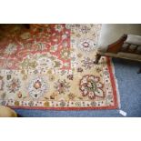 A Ziegler design carpet, the field with an allover design of large flowerheads, palmettes and vines,