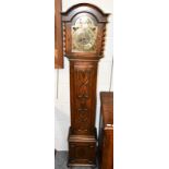 A small Art Deco chiming longcase clock, with triple spring barrel movement striking on gong rods,