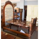 A Victorian mahogany half tester bed with button upholstered head board, 140cm by 200cm by 220cm