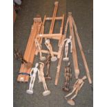 A quantity of artist's easels and figures