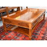 A burr walnut, featherbanded and crossbanded coffee table, retailed by Barker & Stonehouse,